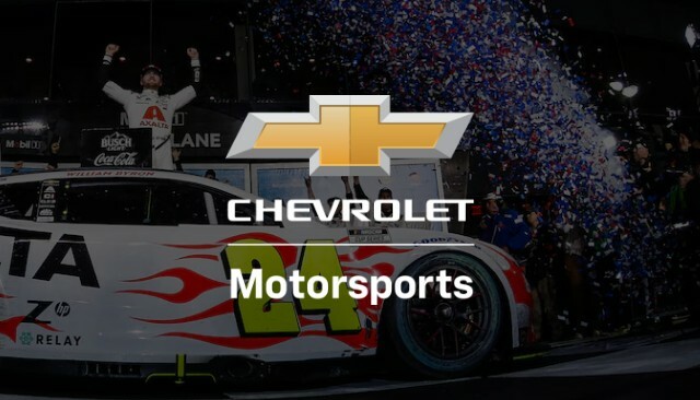The Chevrolet Motorsports Racecar and Team Chevy Driver Celebrating a NASCAR Win.